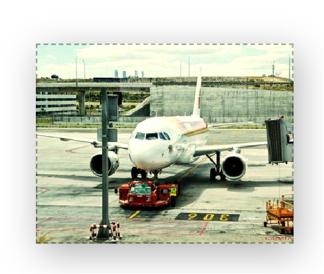 An airplane at the gate